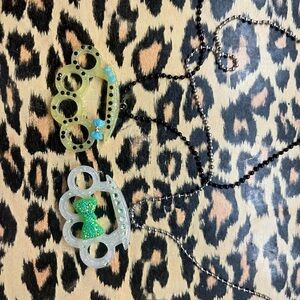 Brass knuckles necklace